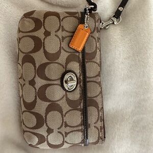 Coach wristlet Size: 4 by 8 inches